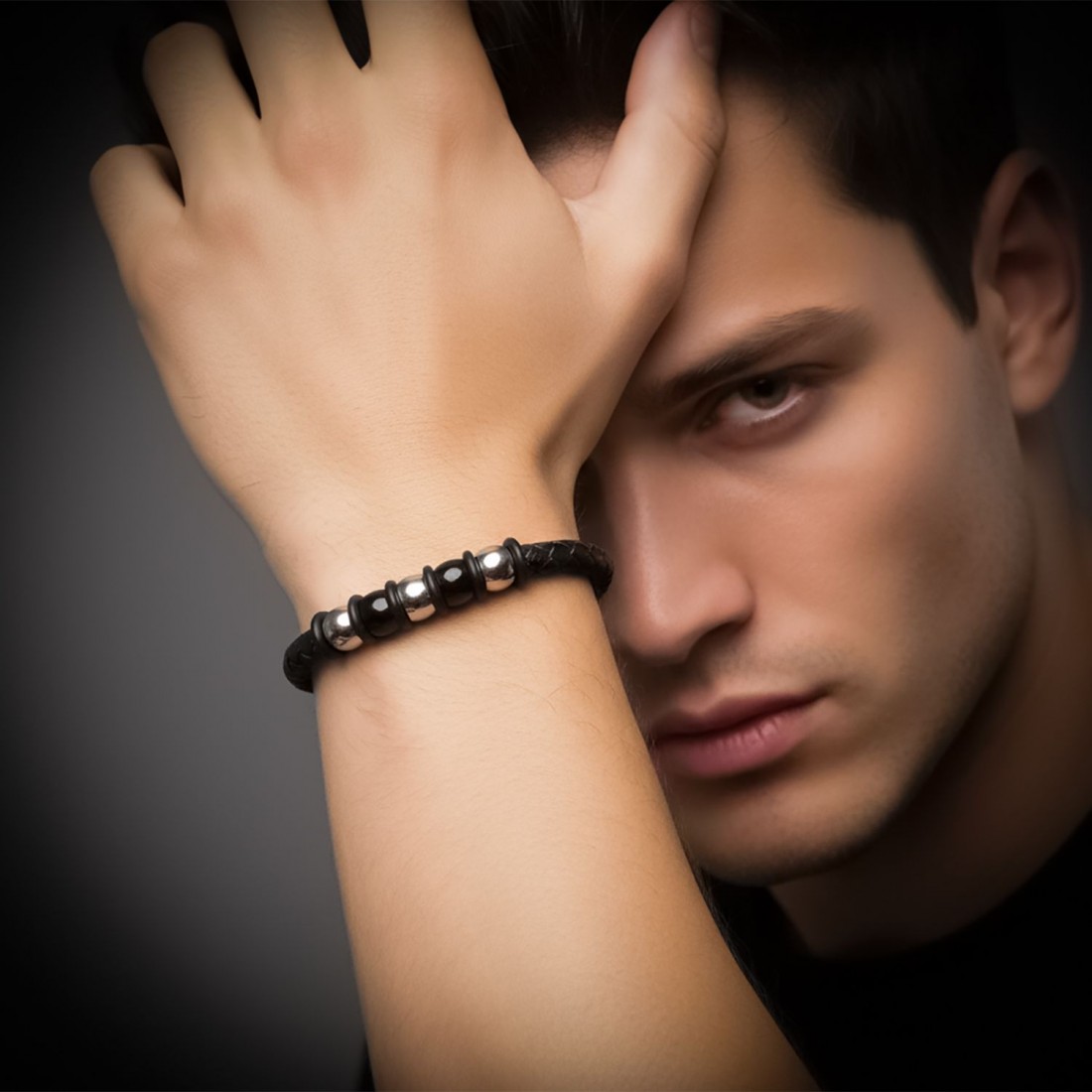 Toptan siyah örgü deri ve çelik detaylı erkek bileklik